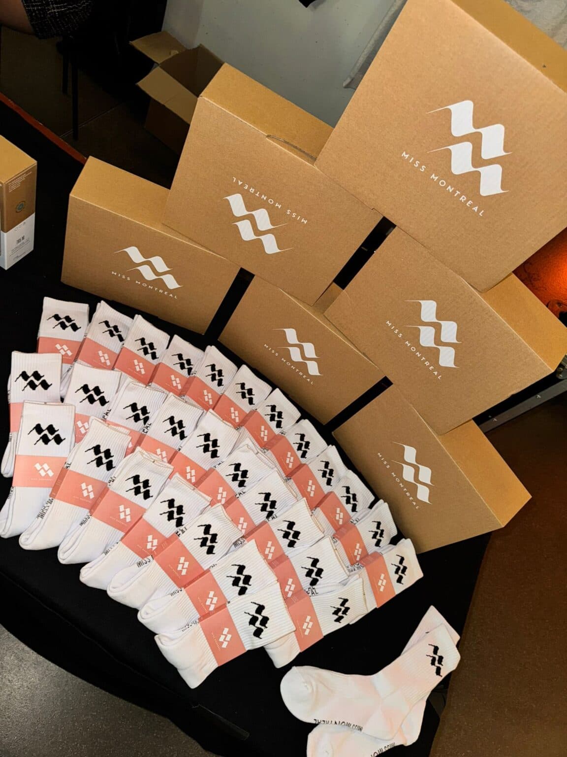 Branded boxes and socks packed for a customer